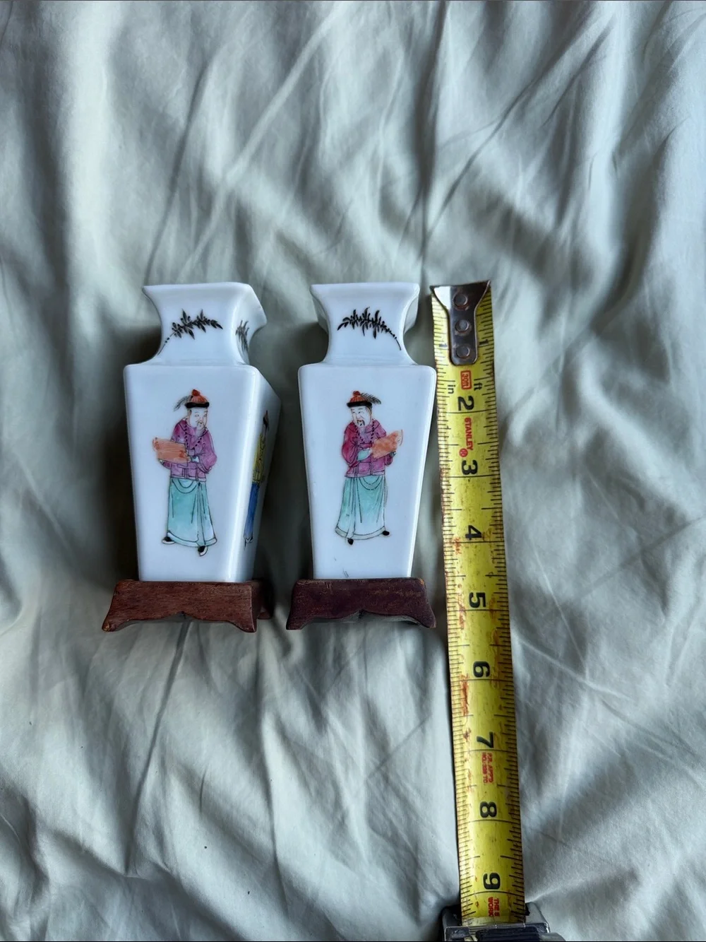 Pair of White Porcelain Vases with Hand-Painted Figures